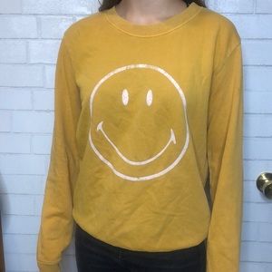 Yellow smiley face sweater